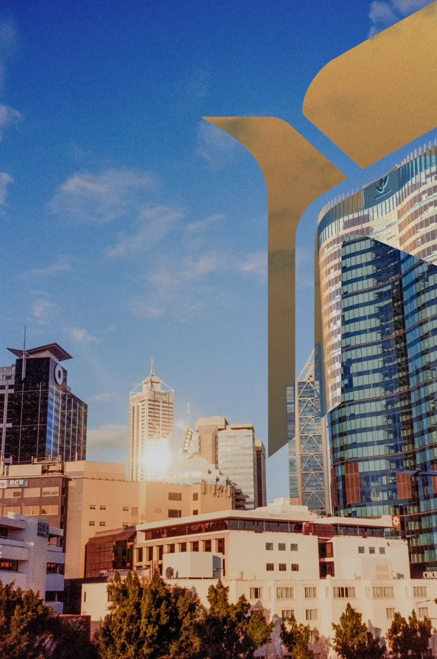 The gold Kestaris falcon mark rising over the Perth CBD skyline at golden hour